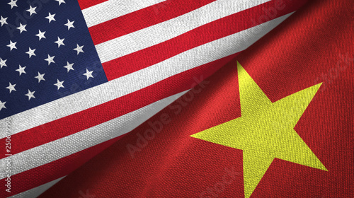 United States and Vietnam two flags textile cloth, fabric texture photo