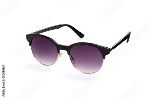 Stylish women's sunglasses on a white background. In a half turn.