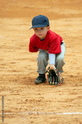 Photography Cute boy playing tee ball or baseball
