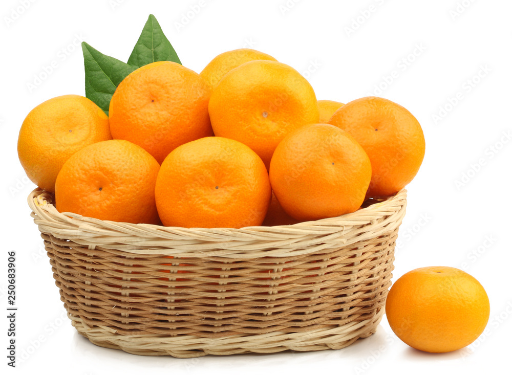 Fresh tangerines in a basket isolated on white Fresh tangerines in a basket isolated on white