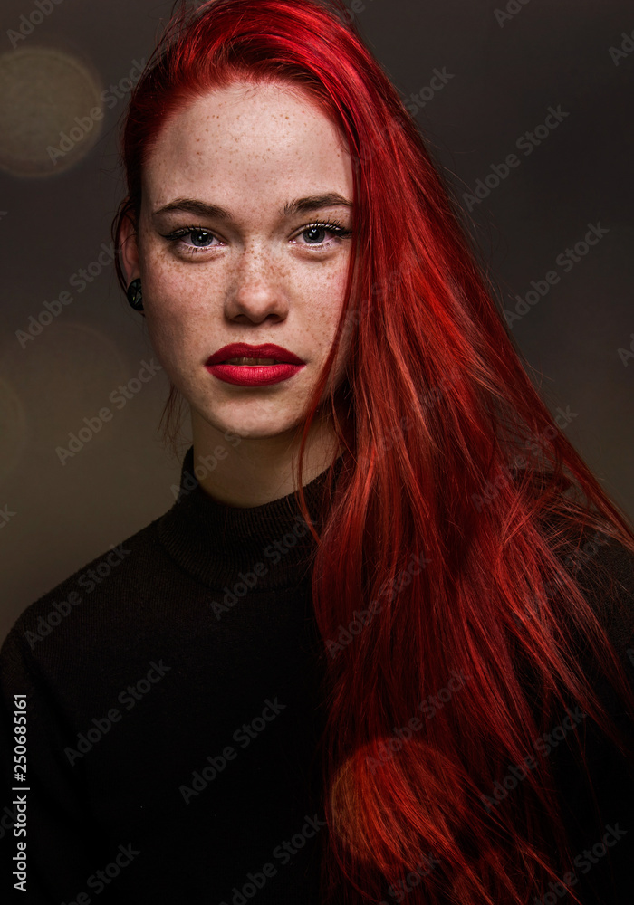 Beautiful natural freckle young girl with long red hair close up portrait Beautiful natural freckle young girl with long red hair close up portrait