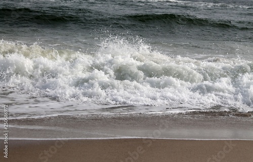 strong foamy sea waves