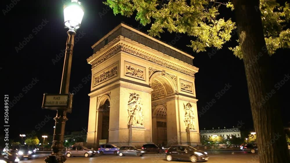 WS Traffic in front of Arc De Triomphe at night / Paris, France
