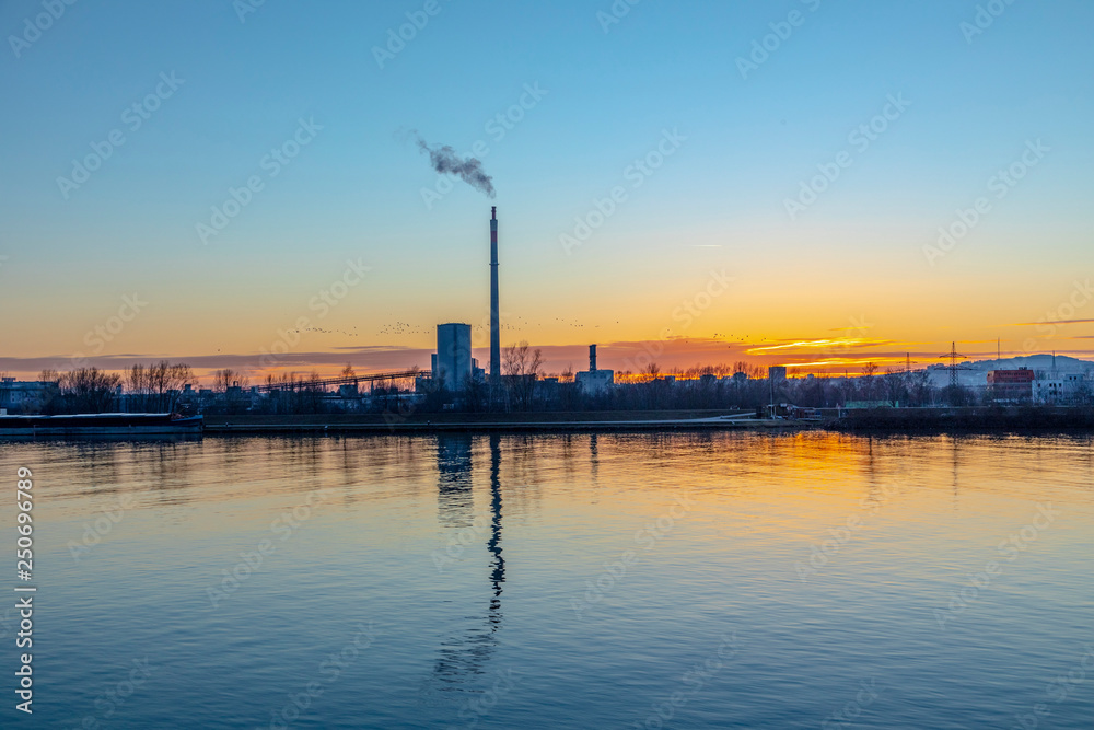 industry at river Danube in Linz, Austria in sunset