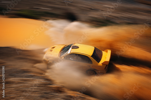 Rally vehicle going fast with mud and water splash © Moose
