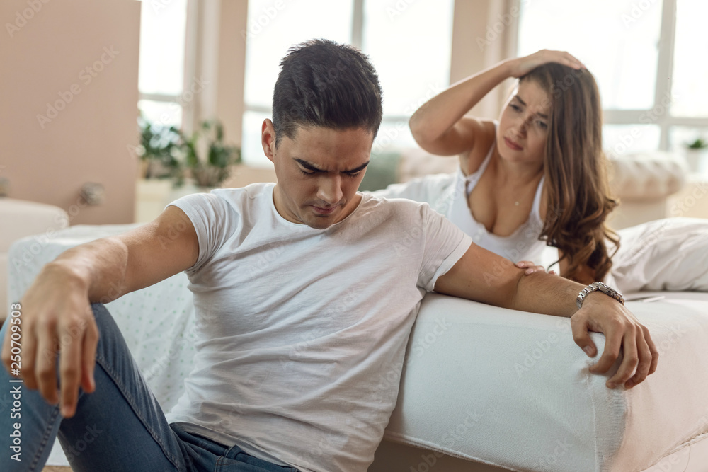 Obraz premium Young couple having relationship problems in the bedroom.