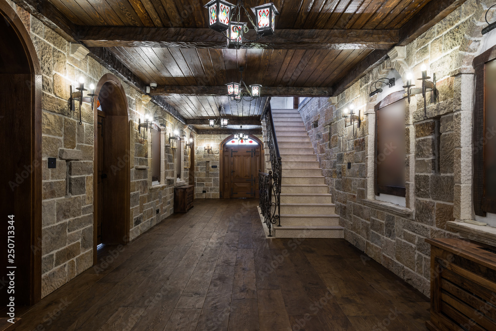 Basement foyer area with wooden doors  and stairs
