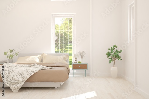 White stylish minimalist bedroom with summer landscape in window. Scandinavian interior design. 3D illustration © AntonSh