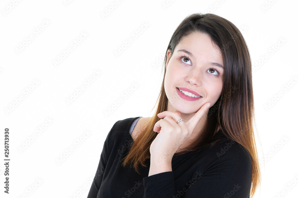 Close up portrait of a cheerful young woman looking up away Close up portrait of a cheerful young woman looking up away