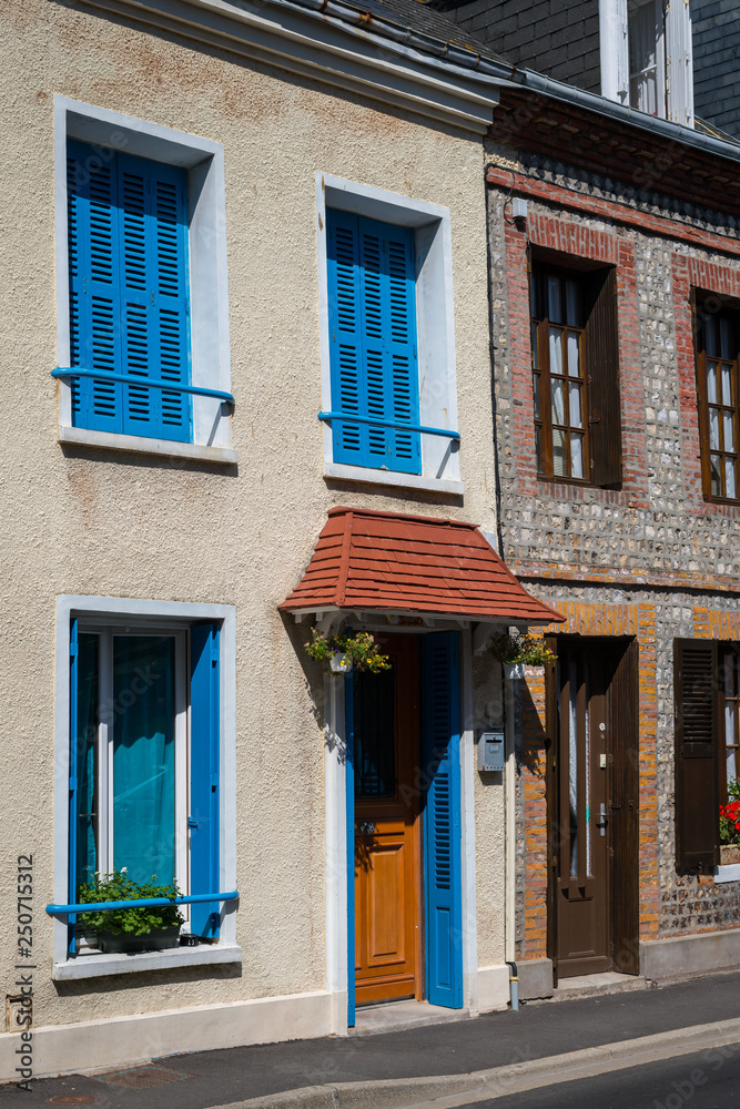 Fototapeta premium Old houses in Etretat on a sunny day in summer