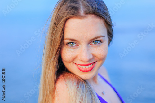 Close up portrait of beautiful girl in blue bra. A girl with a © Ivan