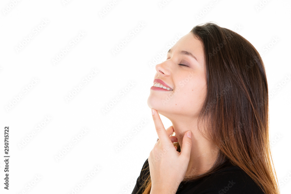 Young female touches her neck profile woman portrait white background Young female touches her neck profile woman portrait white background
