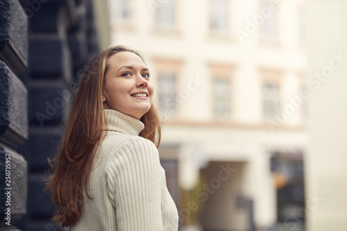 portrait of young happy woman outside in the city Free Download portrait of young happy woman outside in the city - GFXLoad