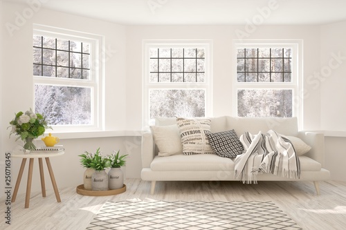 White stylish minimalist room with sofa and winter landscape in window. Scandinavian interior design. 3D illustration © AntonSh