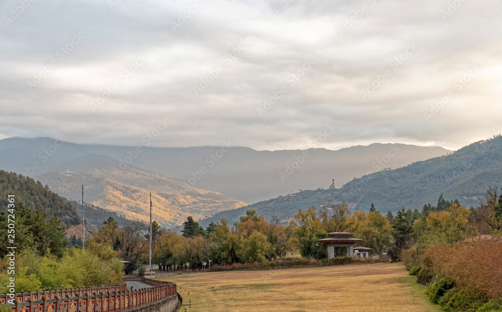 Bhutan, Asia – view of the mountains covered with forests. Bhutan, Asia – view of the mountains covered with forests.