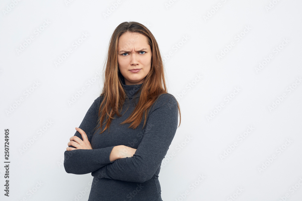 portrait of young woman looking mad in camera