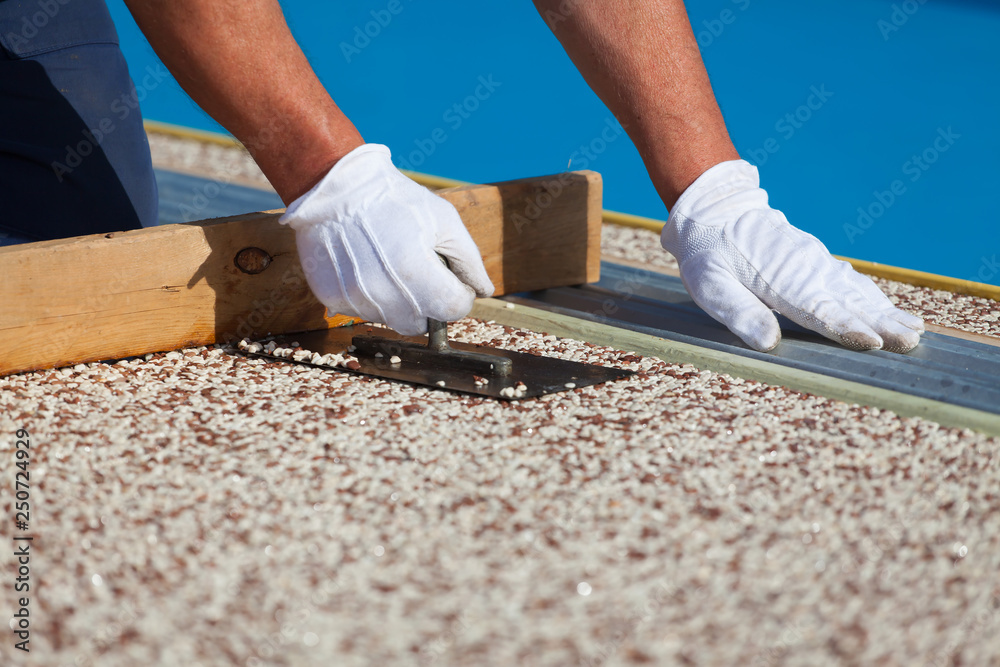 Laying the floor around the outdoor pool.