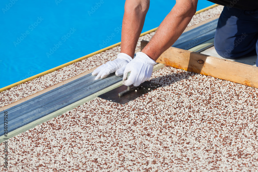 Laying the floor around the outdoor pool.