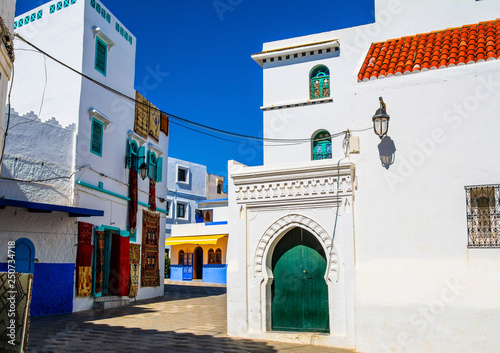 Beautiful view of street with typical arabic architecture in Asilah. Location: Asilah, North Morocco, Africa. Artistic picture. Beauty world
