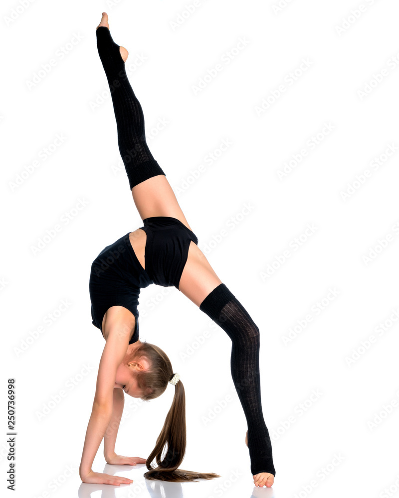 The gymnast performs a bridge with a raised leg.