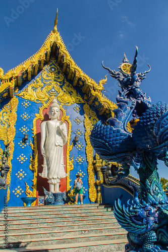 Beautiful public Buddhist church at Wat Rong Sua Ten in Chiang Rai, Thailand. Wat Rong Suea Ten (Temple of Tigers Leaping over Channel) or the Blue Temple is above all its magnificent blue interior.