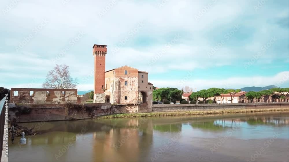 Pan of Pisa Old Citadel Tower (Cittadella vecchia) on Arno River, Tuscany, IT Pan of Pisa Old Citadel Tower (Cittadella vecchia) on Arno River, Tuscany, IT