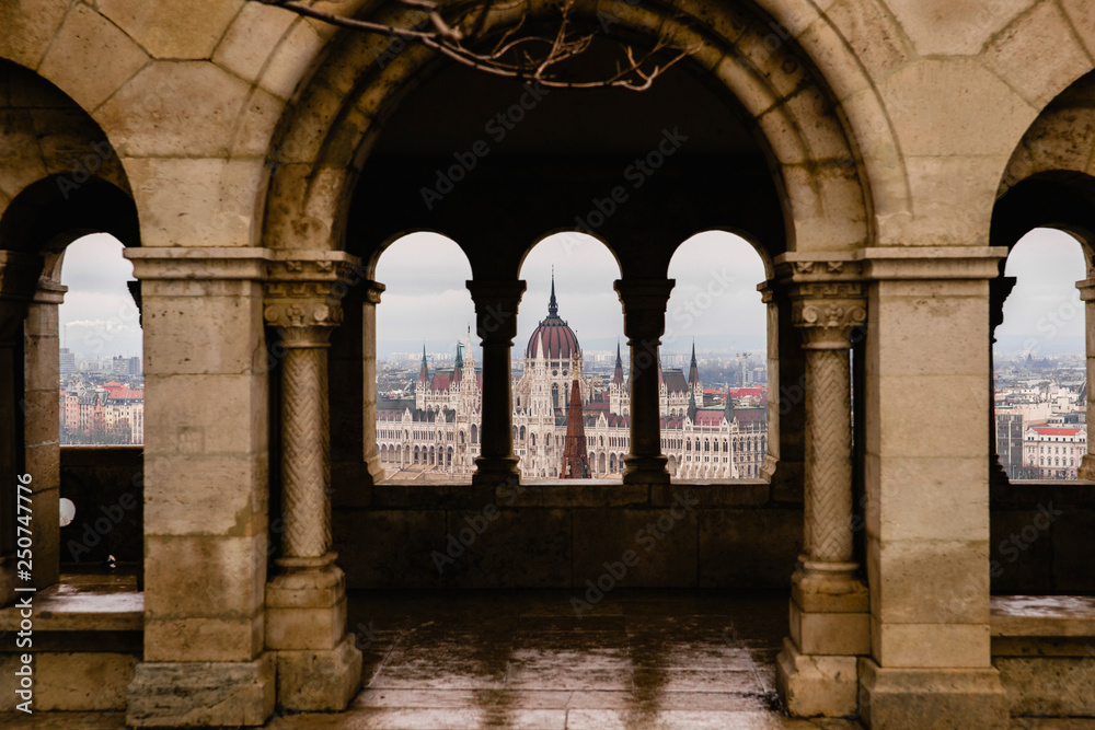 Views of the Hungarian Parliament through the walls of the Budapest Castle.