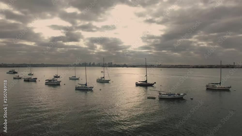 Aerial 4K view of sailboats backed by San Diego from Coronado Island. #2 Aerial 4K view of sailboats backed by San Diego from Coronado Island. #2