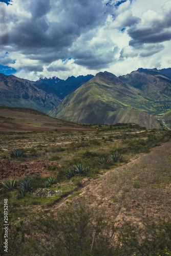 landscape in the mountains under clouds in sacred valley peru