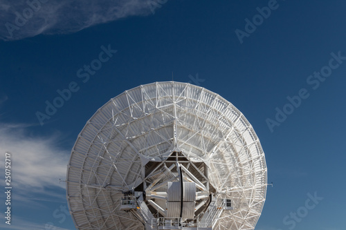 Very Large Array centered rear view of radio astronomy observatory dishes, science technology, copy space, horizontal aspect