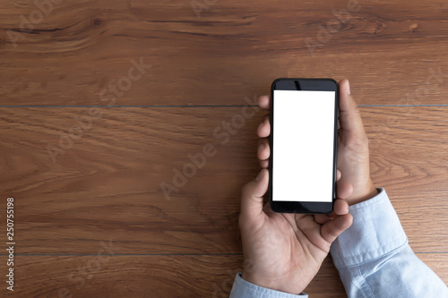 Man hand holding the black smartphone screen mockup