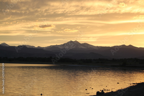 Sunset over the Rocky Mountains over a Lake