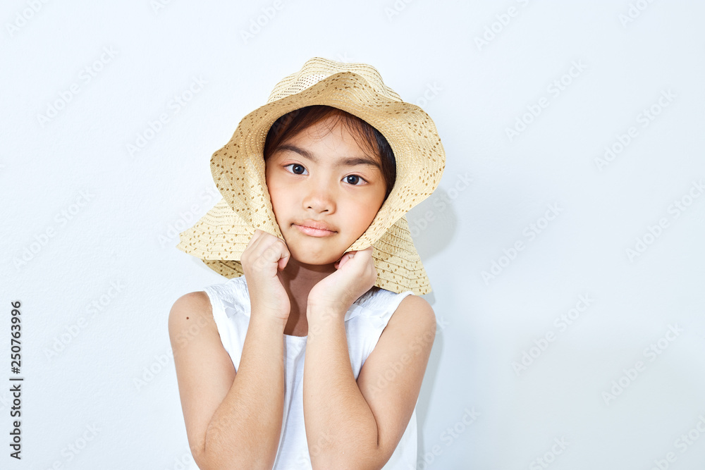 asian slim girl wearing hat on white background. asian slim girl wearing hat on white background.