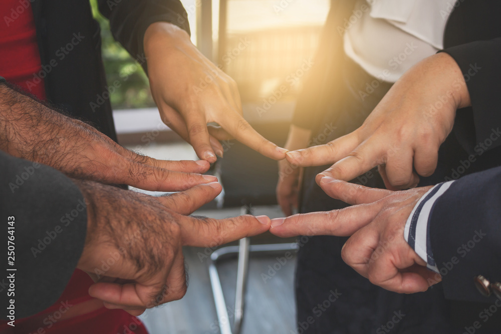 Business people joined hands,Teamwork concepts for commitment to Success Business people joined hands,Teamwork concepts for commitment to Success