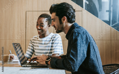 Colleagues in a workspace working together