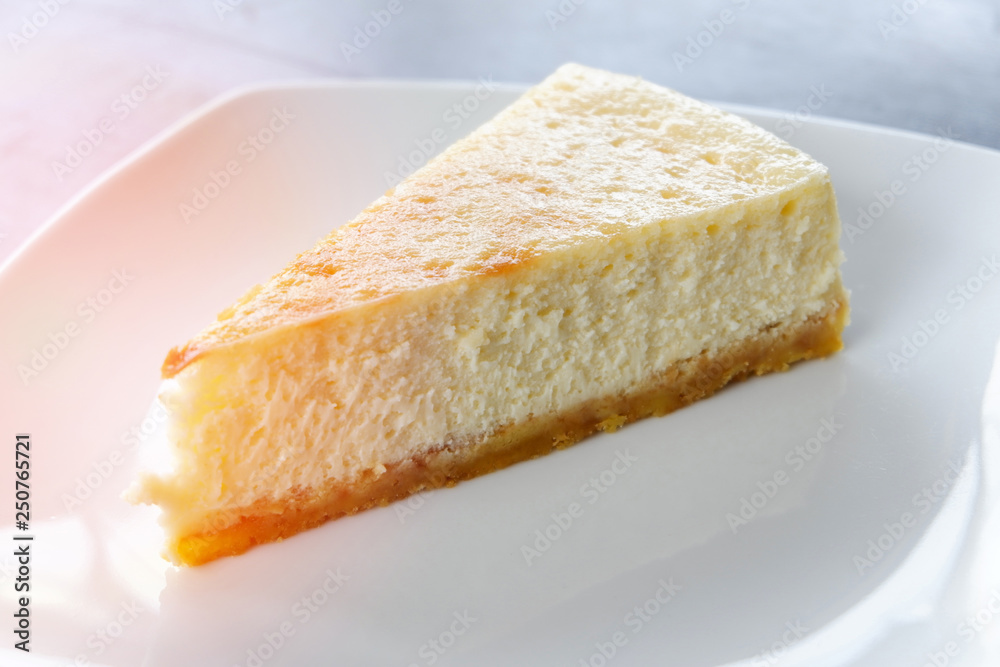 milk cake sweet food / piece of dessert delicious vanilla cake slice on white plate on the table background