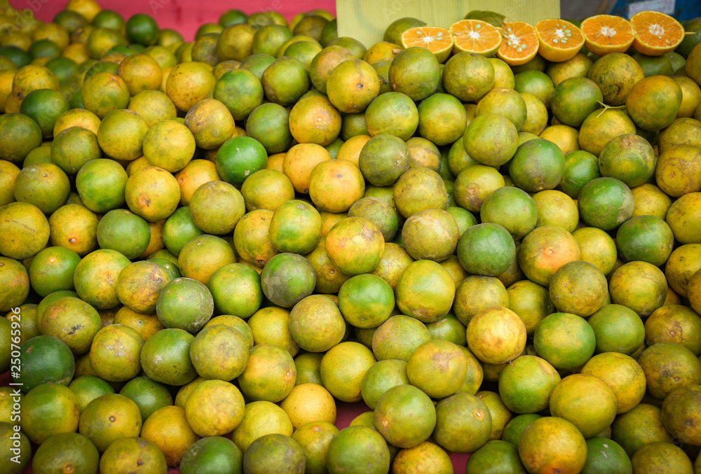 Fresh orange fruit texture background for sale in the market - Asia orange organic tropical fruit