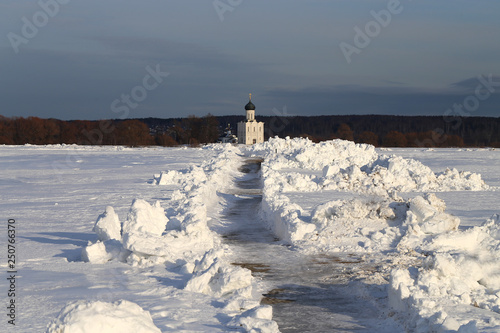Photo of the winter landscape of the white Christian Church Bogolyubovo