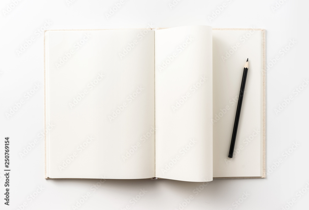 Business concept - Top view collection of light yellow fabric notebook, pen, flip curl rolled page and white open page isolated on background for mockup Business concept - Top view collection of light yellow fabric notebook, pen, flip curl rolled page and white open page isolated on background for mockup