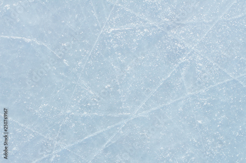 Ice hockey rink scratches surface abstract background.