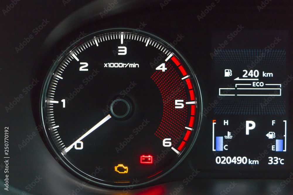 close up dashboard car show engine light and batterry light close up dashboard car show engine light and batterry light