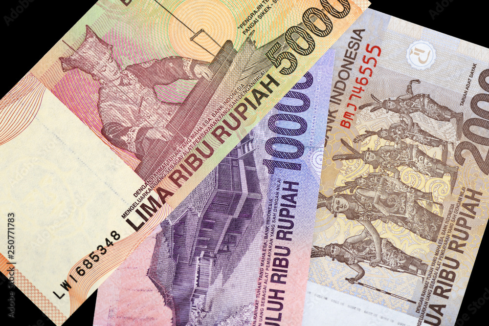 Indonesian rupiah on dark background close up