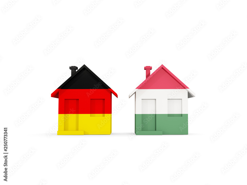 Two houses with flags of Germany and hungary Two houses with flags of Germany and hungary