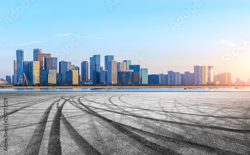 Empty asphalt road and city skyline with buildings in Hangzhou © ABCDstock
