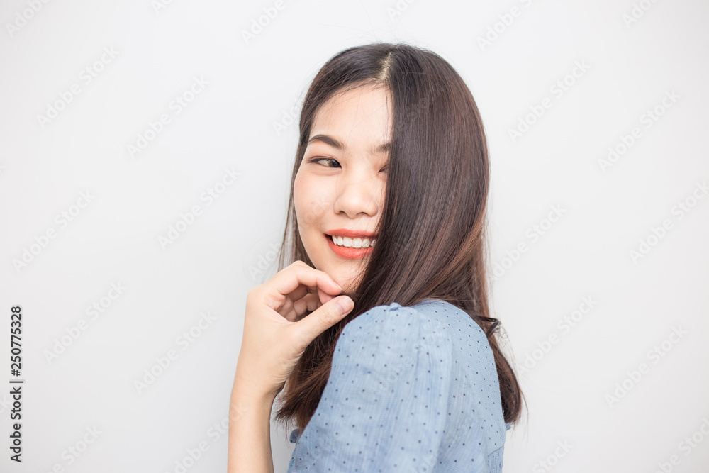 Studio portrait of asian beautiful smiling women Studio portrait of asian beautiful smiling women