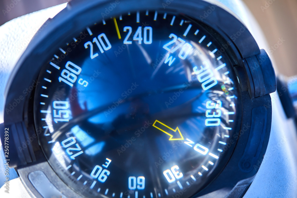 Close up of nautical compass on yacht Close up of nautical compass on yacht