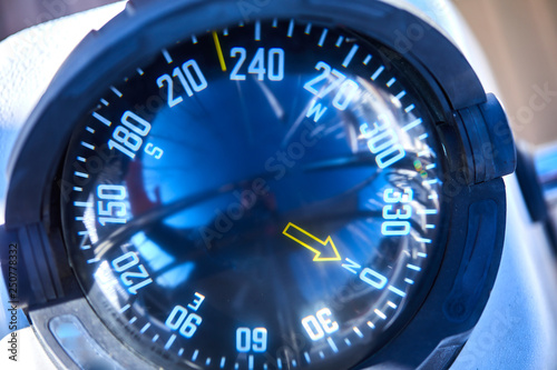 Close up of nautical compass on yacht