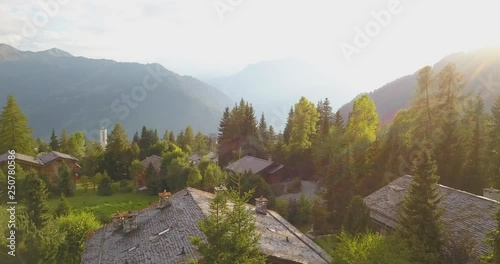 drone shot of verbier with sunset photo