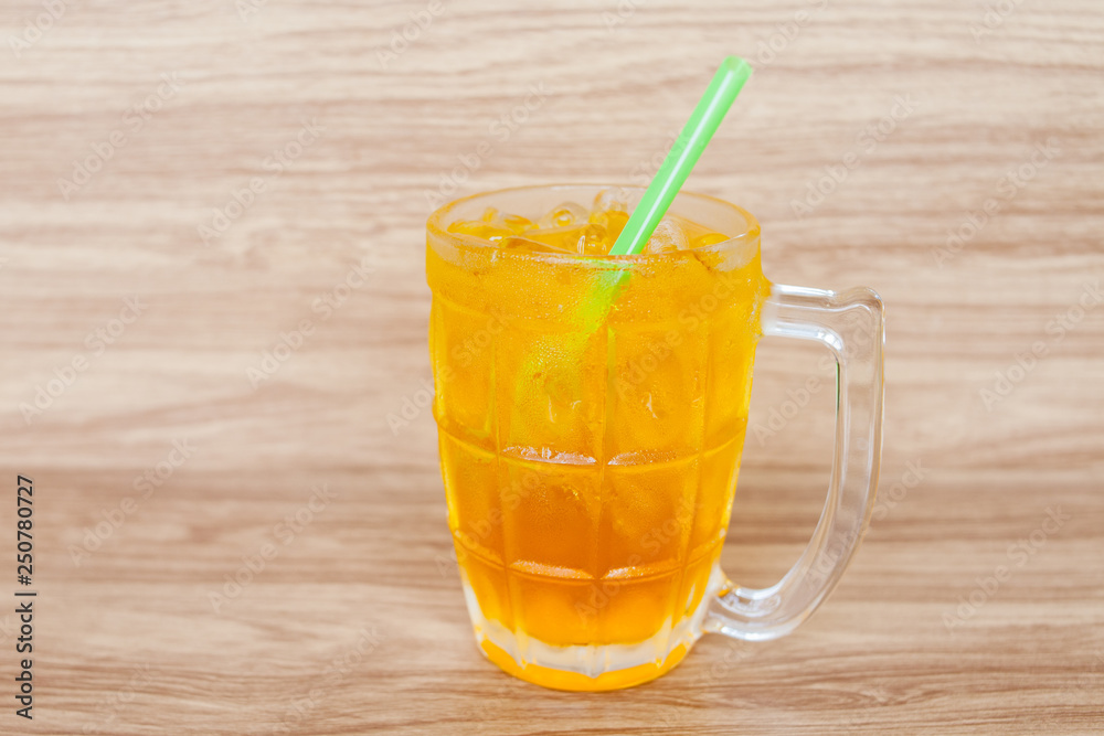 chrysanthemum tea fresh drink with ice put on wood floor and wood background chrysanthemum tea fresh drink with ice put on wood floor and wood background