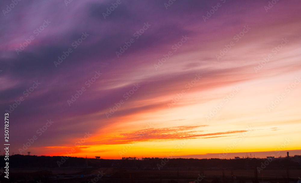 Colorful sunset on cloudy sky. Amazing colors on the evening sky.